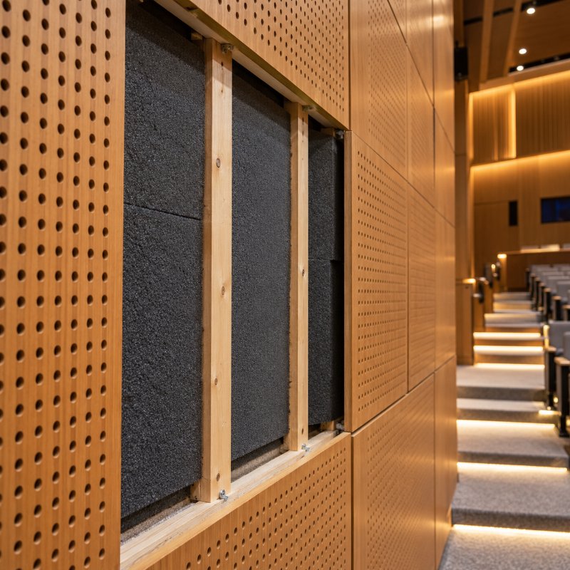 Behind perforated panels: sound insulation pads in Singapore